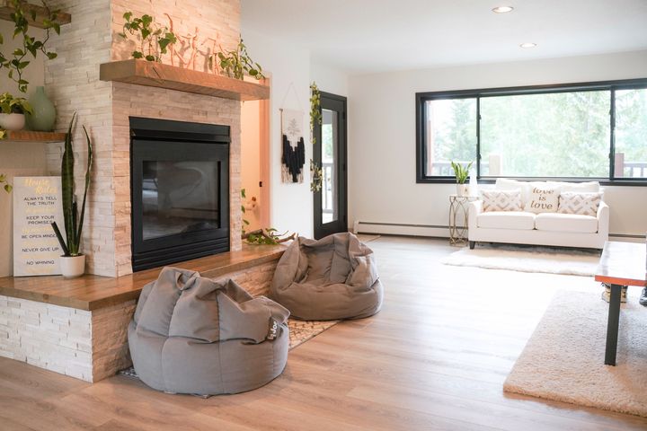Living room with stone fireplace